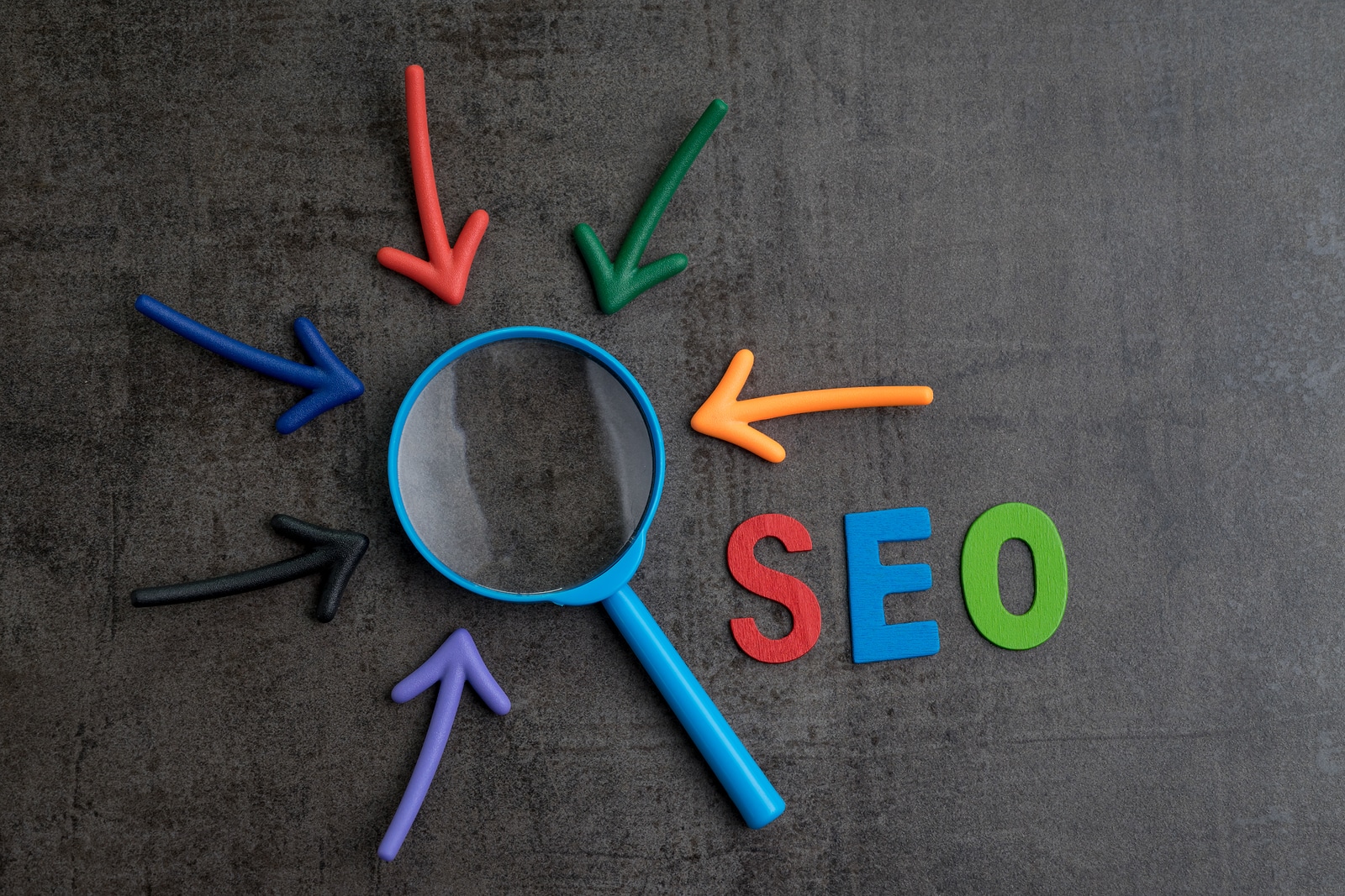 The letters S. E. O. with a magnifying glass and errors pointing to it to show how this post focuses on keyword placement for counseling websites to improve search engine optimization.