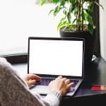 Girl online searching for answers. This girl is wondering how she can build high quality backlinks for her practice. Backlinks for therapy practices are not easy to come by, but with some luck she will have some success with SEO for counselors.