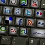 A keyboard with different social media platforms on each key for Simplified SEO Consulting. Contact us for support with SEO marketing for therapists, Learn how social media and SEO can help your site grow!