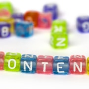 Image of colorful beads spelling "content." This image represents how you can work with an SEO services consultant for your private practice website to learn more about content as it relates to SEO.