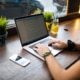 An image of someone on a computer. Represents how during Covid-19 therapists can take this time to boost SEO