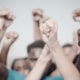 Hands up for a social movement. 65201