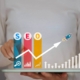 Cartoon rocket blasting off next to the words SEO. This photo represents how seo training for therapists can help you reach more ideal clients.
