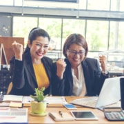 Shows two therapist excited for Simplified SEO Consulting's new package. Represents how seo for mental health is beneficial for private practices.