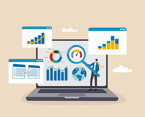 Laptop with graphs surrounding it. SEO for personal injury lawyers is important! Learn SEO keywords here.
