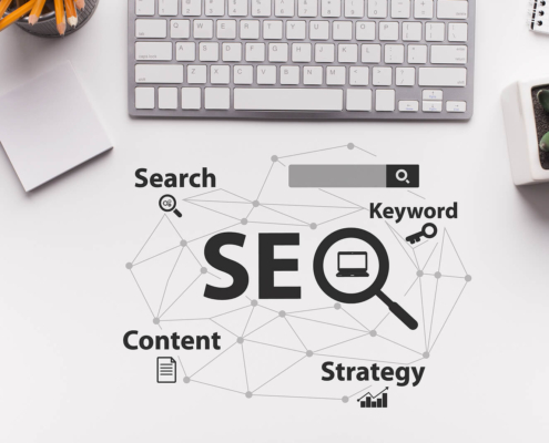 The words SEO on a table with a laptop on it. Don't know what SEO is and how Local SEO for doctors can help your practice? We work to help people understand SEO in healthcare.