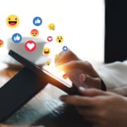 Shows someone on social media. Represents how seo for mental health professionals can support clinicians in increasing their visibility.