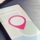 Shows a location indicator on a phone. Represents how local seo for personal injury lawyers helps find ideal clients. Learn more about local SEO techniques here.