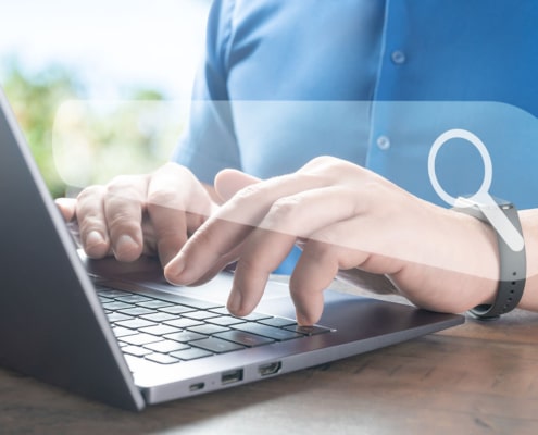 Photo of a man typing on a computer with the search bar showing. Learn to effectively create helpful content for your private practice SEO on your website with the help of readability!