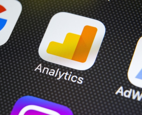 The Google Analytics symbol on a black background representing Analytics for SEO.