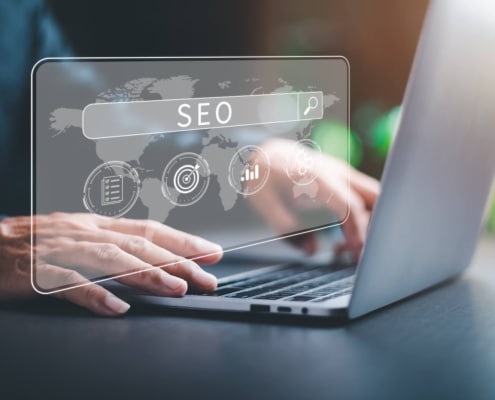 SEO in search bar on laptop. SEO is great to grow your law firm, counseling practice or functional medicine practice. Learn more SEO tricks here!