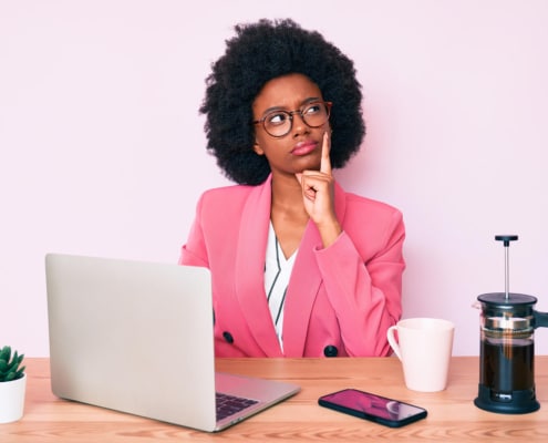 Shows a therapist wondering what an SEO agency does. Represents how private practice seo can be enhanced with search engine optimization for counselors.
