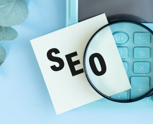 SEO typed on a sticky note. Learn how to advertise your therapy practice here! We have SEO techniques that can help.