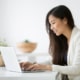 Shows a therapist working on their private practice SEO. Represents how SEO for mental health can support your online therapy site.