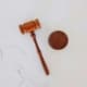 A wooden gavel on marble counter. Learn more about local SEO for personal injury lawyers here. We are ready to help you rank higher on Google!