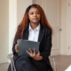 Shows a therapist holding a folder full of notes. Represents how seo for online therapist and seo marketing for therapists can support your private practice.